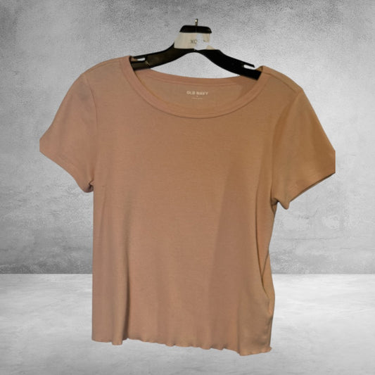 The Xchange Old Navy peach ribbed crew neck t-shirt with short sleeves and a lettuce-edge hem on a hanger.