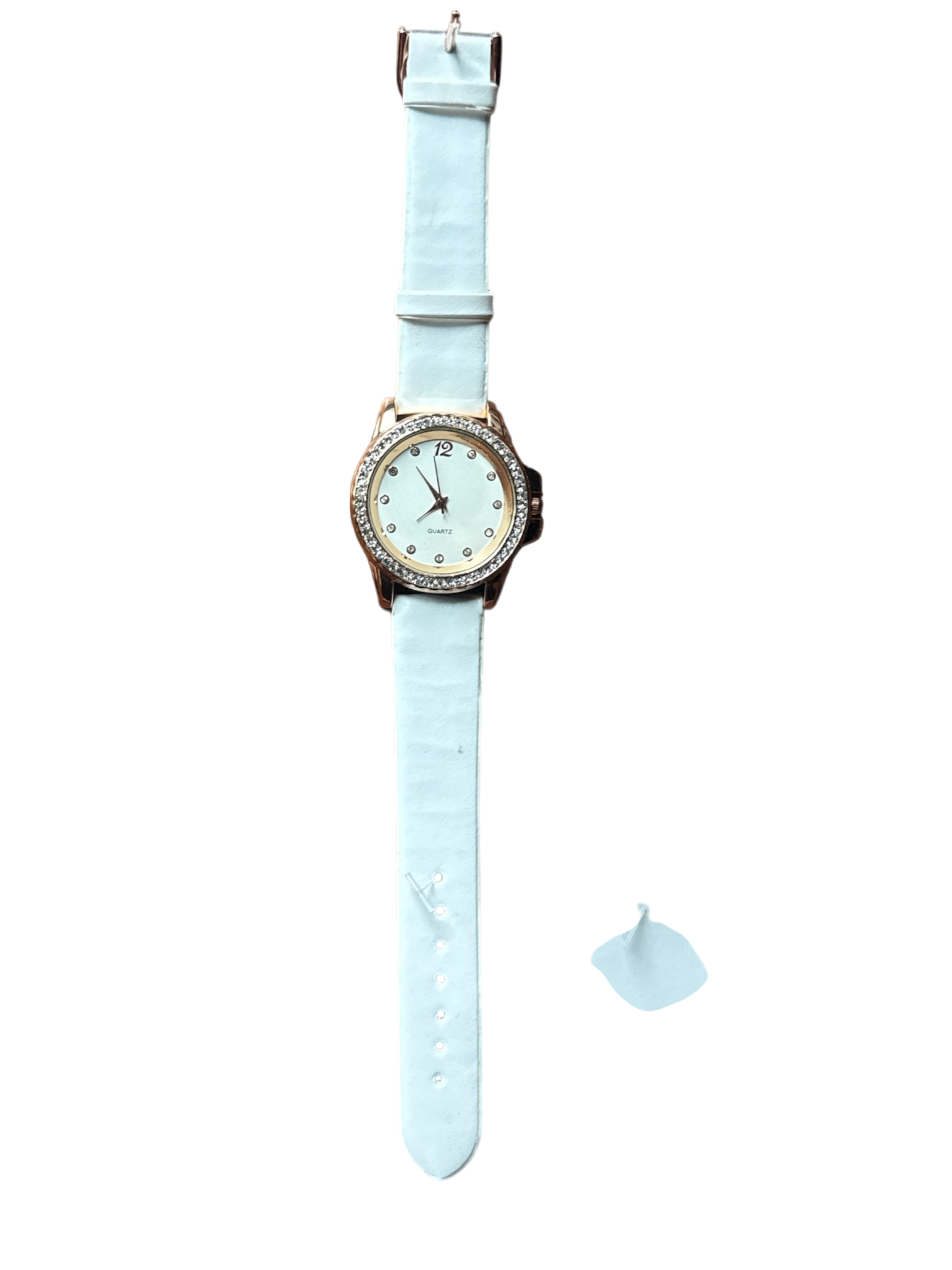The Xchange white leather quartz watch with gold-tone case and zircon-embellished bezel.