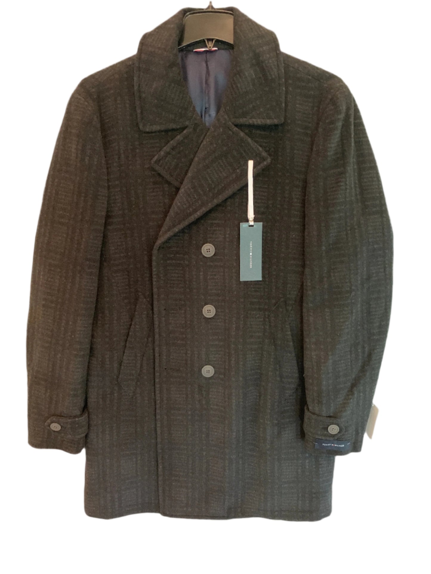 A charcoal gray Tommy Hilfiger plaid jacket with a collar, buttons down the front, and a tag visible on the left side.
