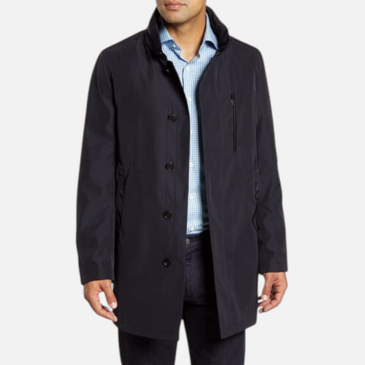 The Xchange John W. Nordstrom Preston blue raincoat with stand collar, button front, and zippered chest pocket.