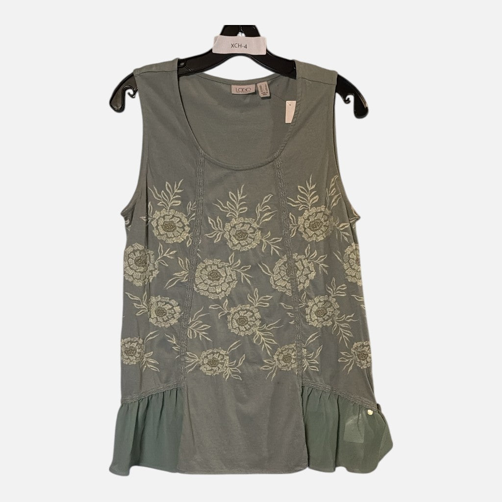 The Xchange sage green sleeveless tank top with cream floral embroidery, scoop neck, and sheer ruffled peplum hem.