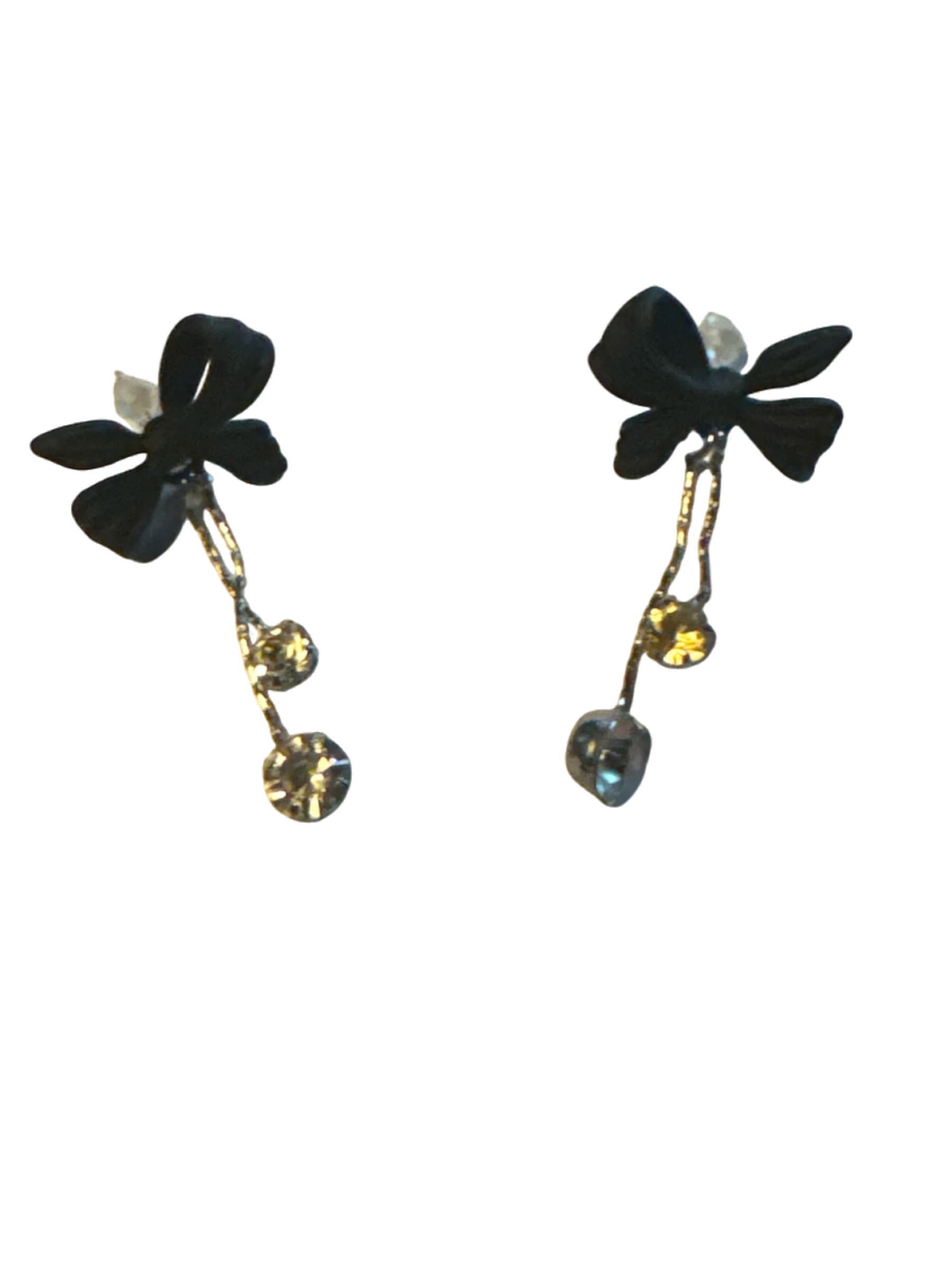 The Xchange black bow statement earrings with silver chain and crystal drop accents.