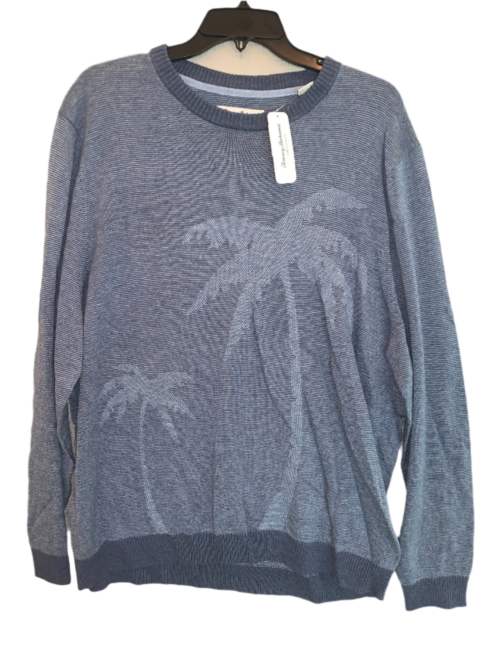 A Tommy Bahama men's crew neck sweater in Monaco blue, with a palm design, displayed on a hanger.